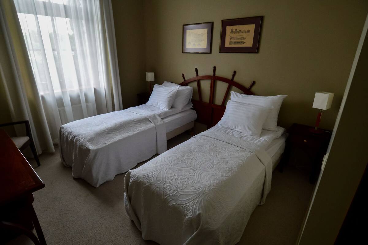 Down comforters, desk, iron/ironing board (on request), WiFi (free)