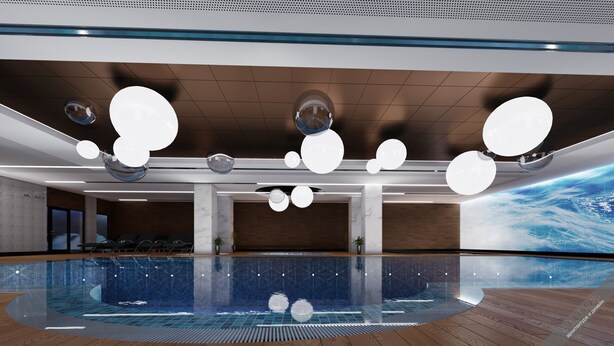 Una piscina interior moderna con terraza de madera, grandes lámparas esféricas y una pantalla digital grande que muestra una escena espacial.