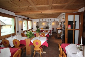 Breakfast, lunch served; international cuisine, al fresco dining 