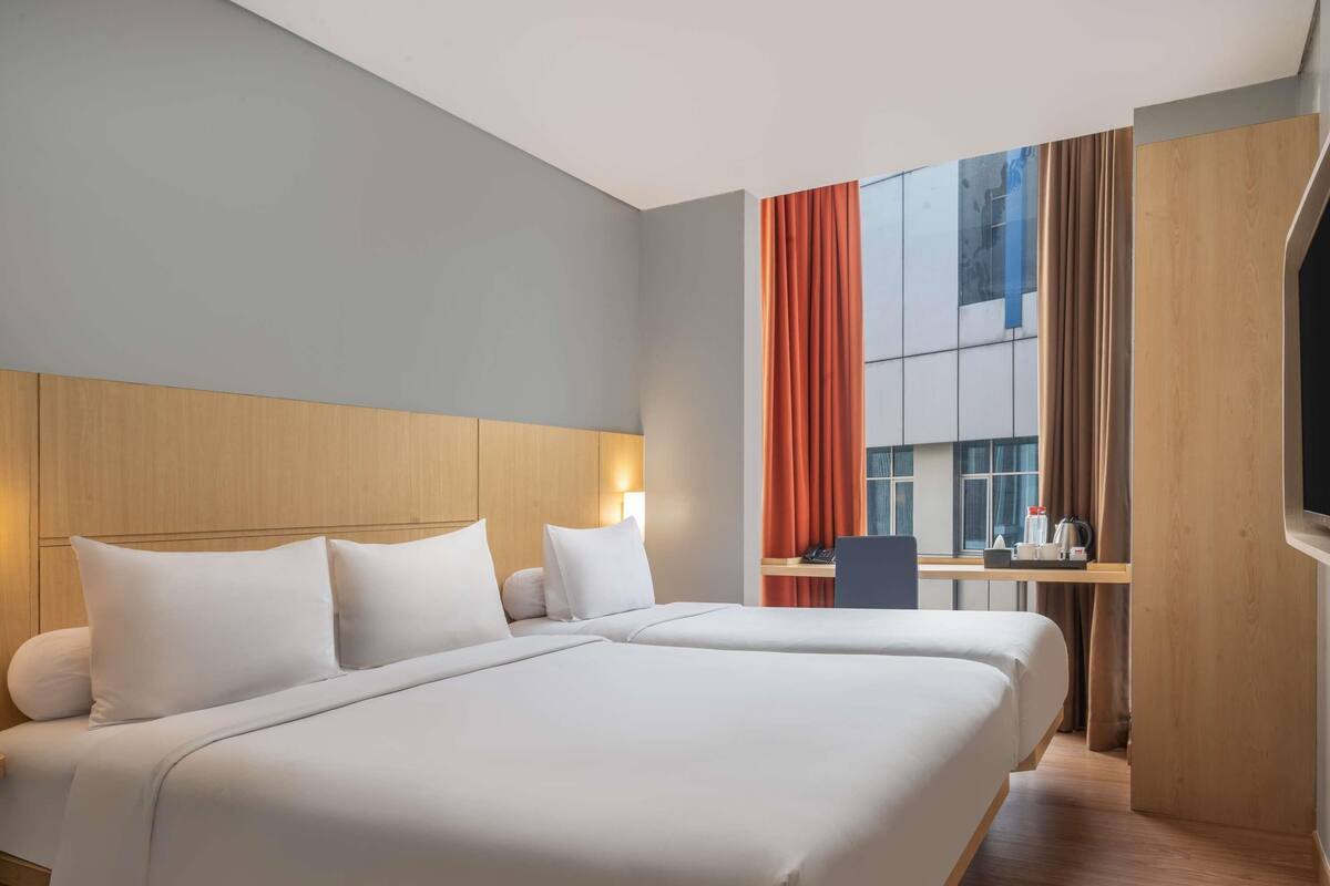 Standard Room, Multiple Beds | In-room safe, desk, laptop workspace, blackout drapes