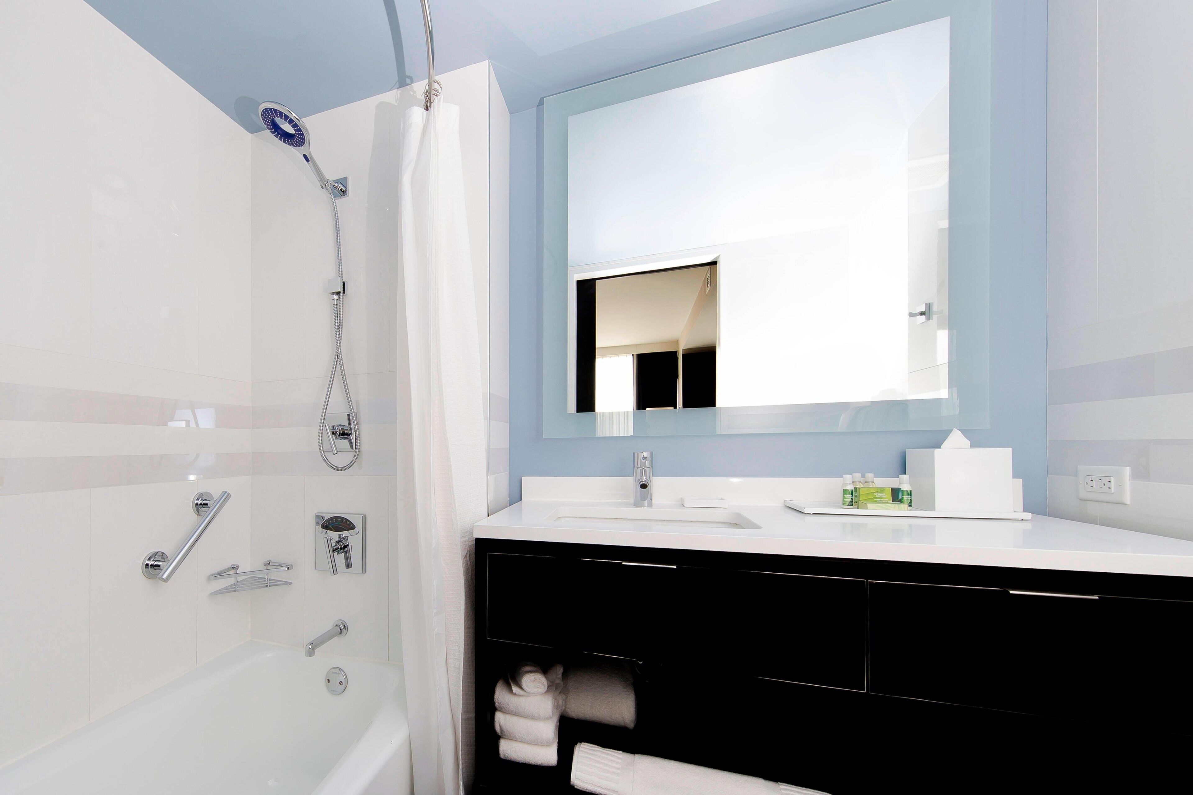 combined shower/bathtub, free toiletries, hair dryer, bathrobes