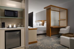 Desk, laptop workspace, iron/ironing board, free cribs/infant beds