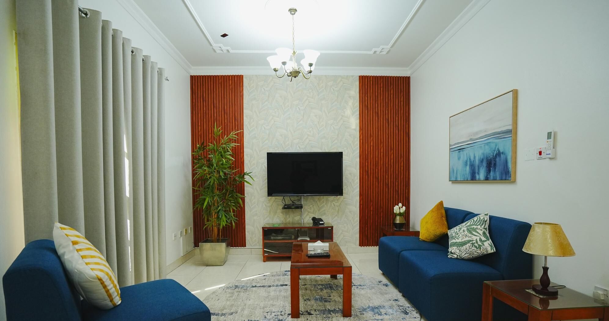 Deluxe Villa, 1 Bedroom | Living area | 50-inch Smart TV with satellite channels