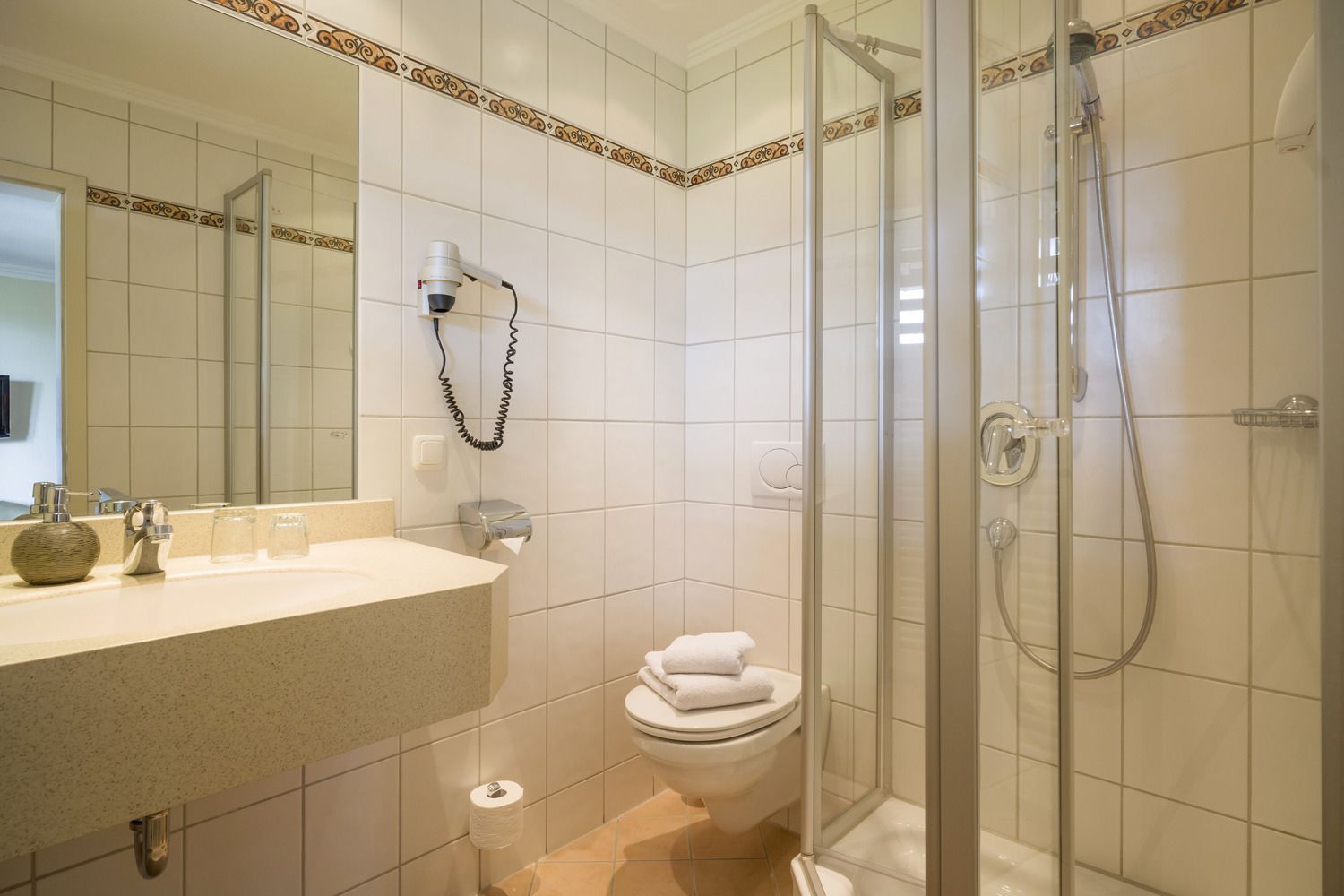 classic double room | bathroom | shower, hair dryer, towels