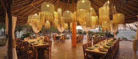 Breakfast, lunch, dinner served; beach views