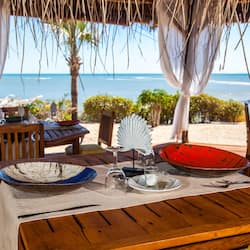 Breakfast, lunch, dinner served; beach views