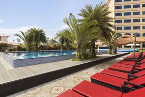 Outdoor pool, open 7:00 AM to 7:00 PM, pool loungers - Ramada by Wyndham Alleppey (Ambalapuzha)