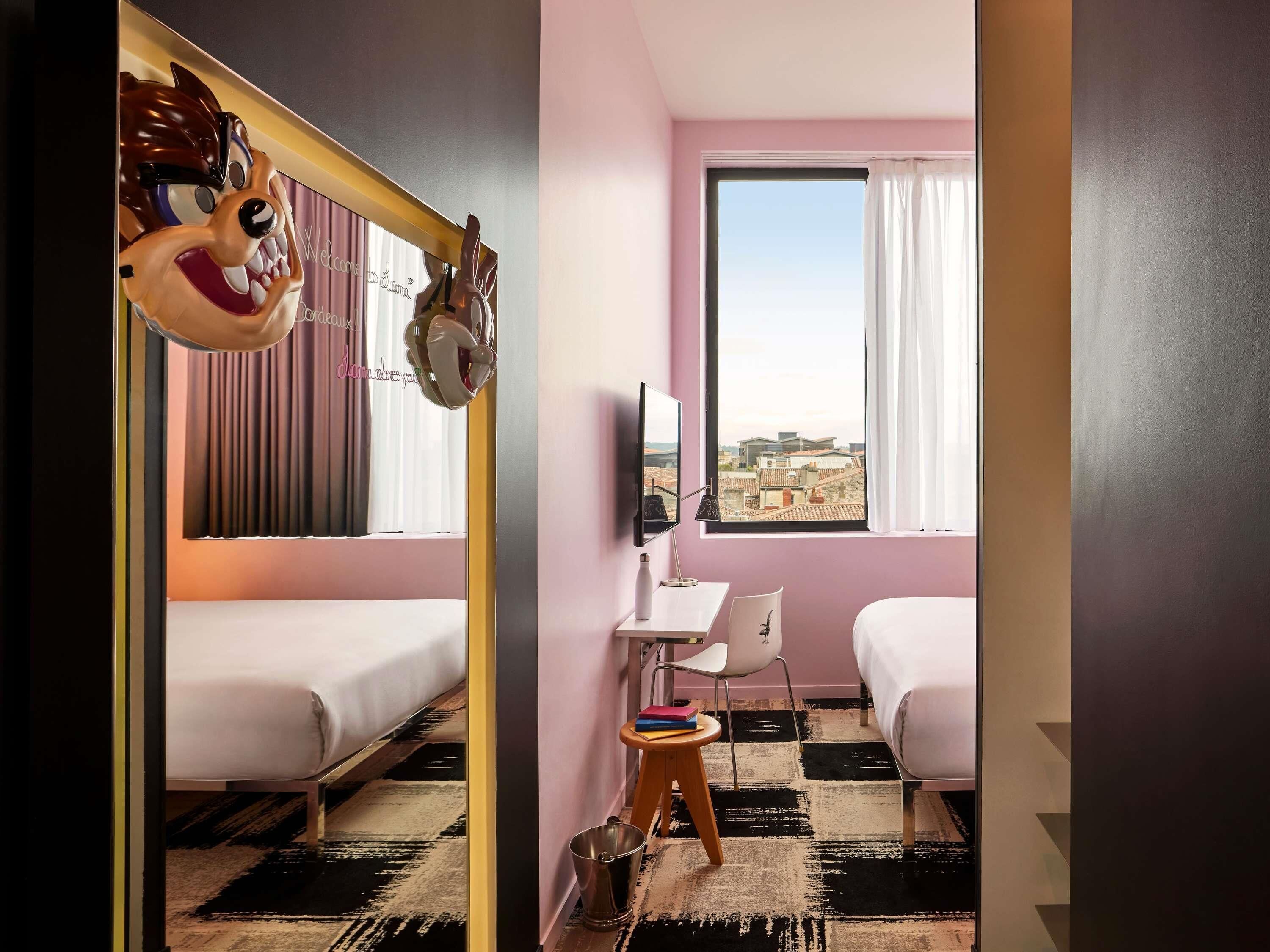 Room, 1 Queen Bed (Small Mama Double) | In-room safe, individually decorated, individually furnished, desk