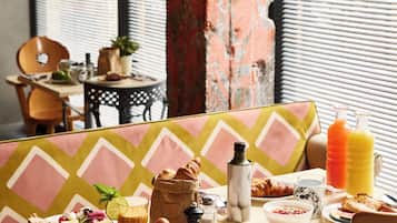 Daily buffet breakfast (EUR 21 per person)