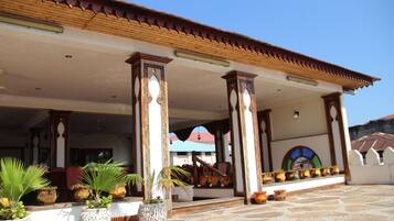 Lunch, dinner served; international cuisine, al fresco dining