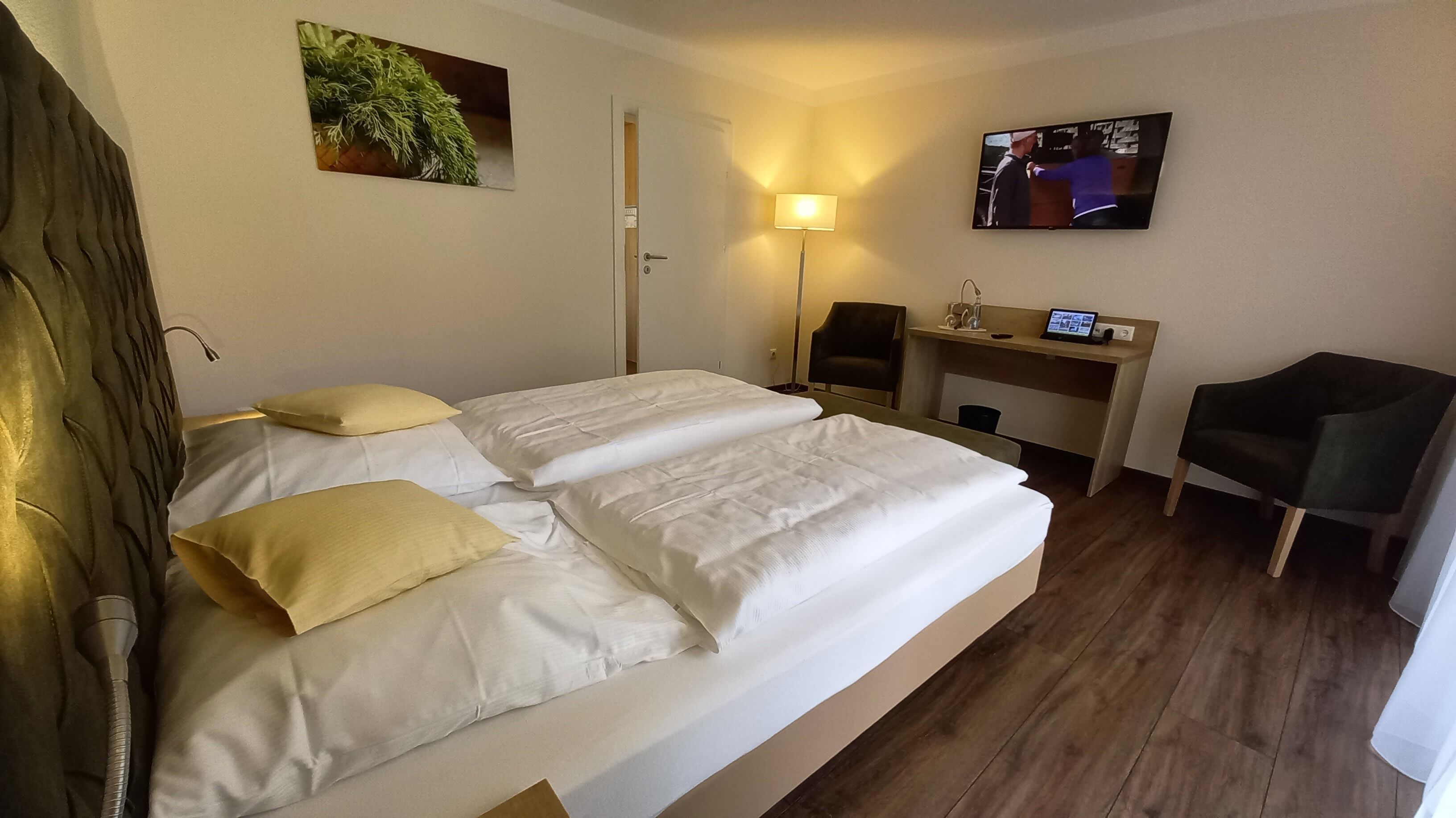 hypo-allergenic bedding, desk, blackout curtains, cots/infant beds