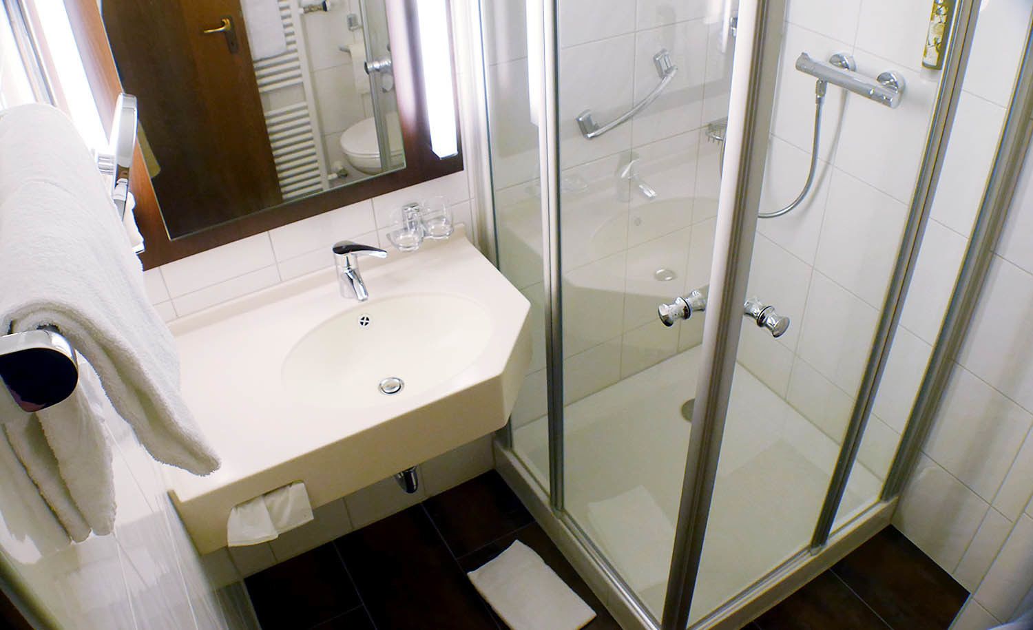 shower, free toiletries, hair dryer, towels