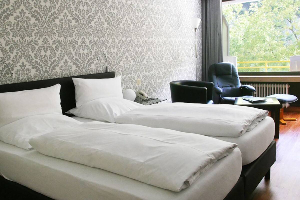 double room, balcony, river view | premium bedding, in-room safe, desk, free cots/infant beds