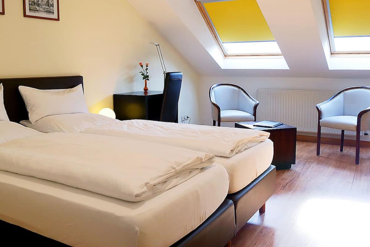 premium bedding, in-room safe, desk, free cots/infant beds