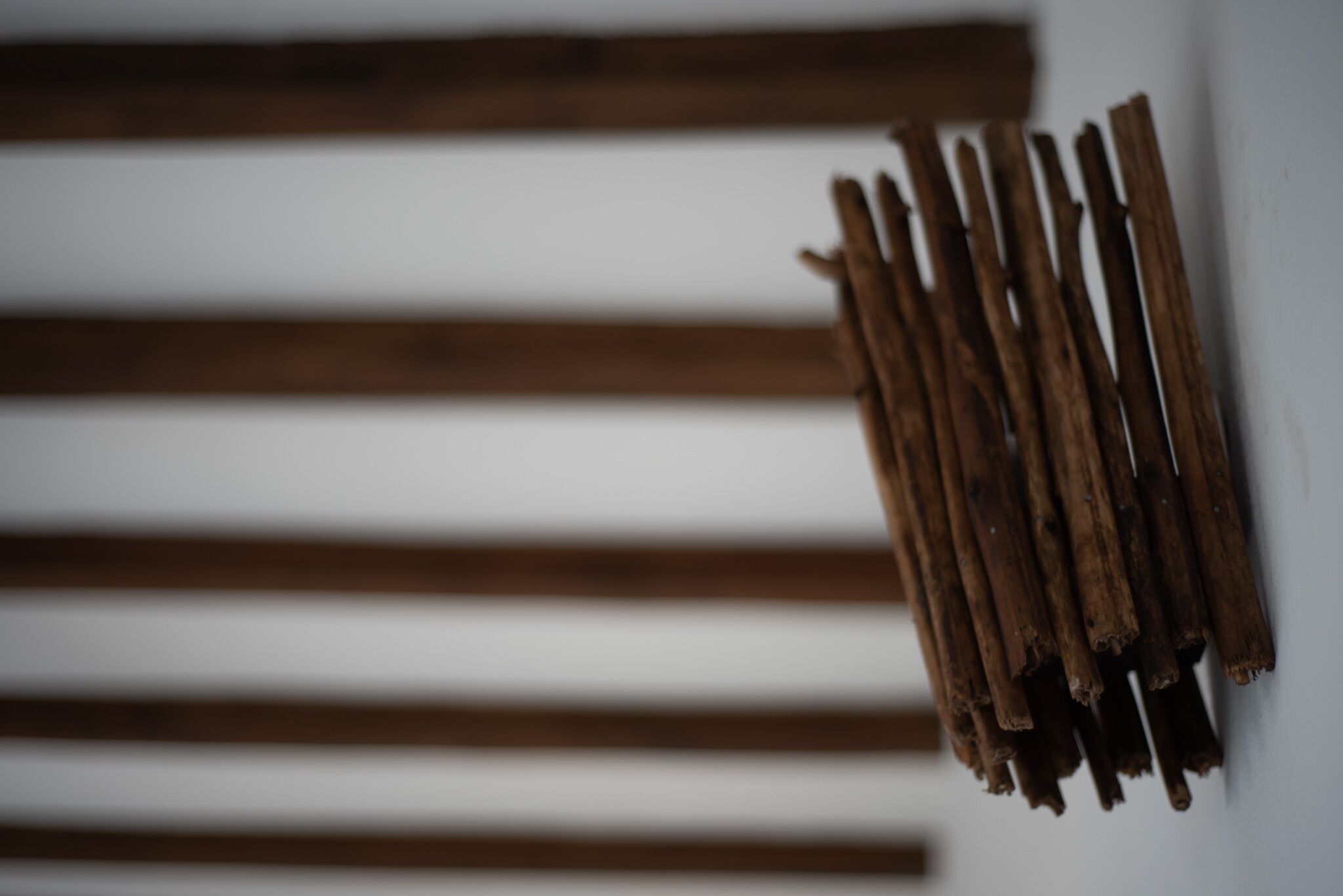A wall with horizontal wooden slats.
