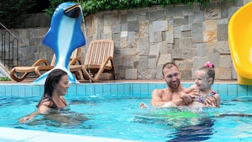 Relax by the pool with a refreshing swim or a fun slide.