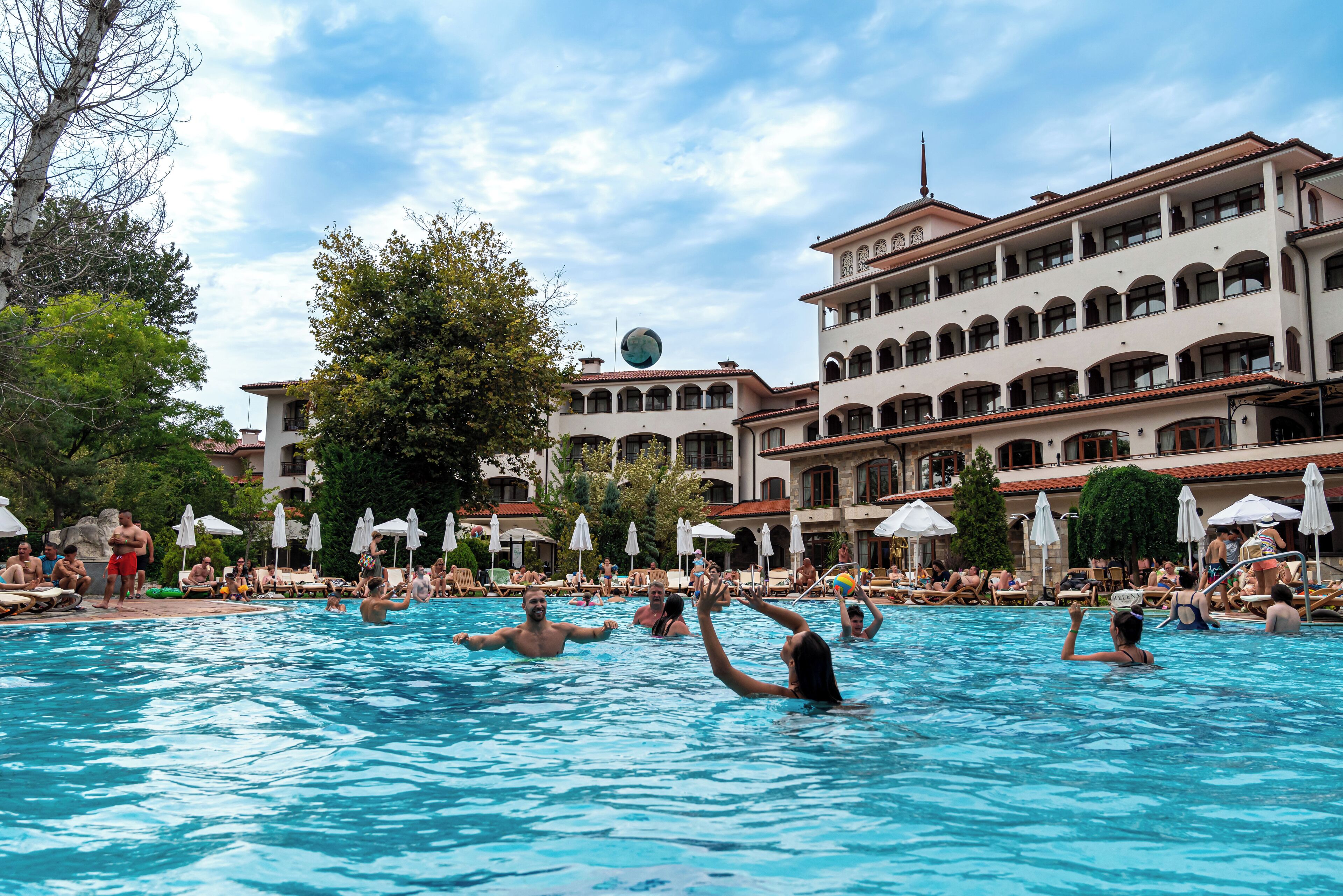 Indoor pool, outdoor pool, open 9 AM to 7 PM, pool umbrellas