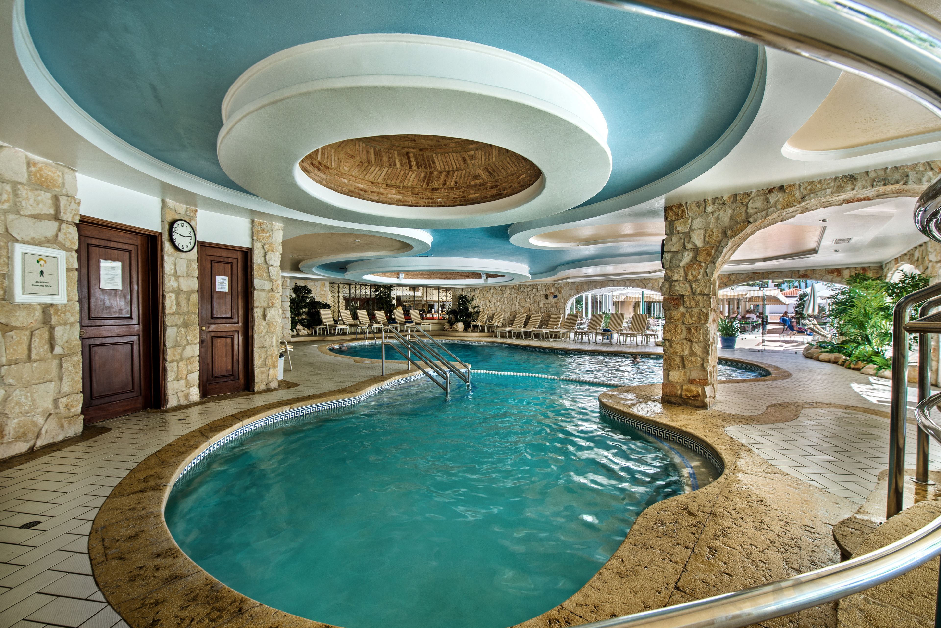 Indoor pool, outdoor pool, open 7 AM to 11 PM, pool umbrellas