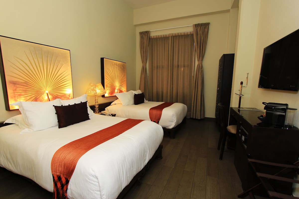 Deluxe Room, 2 Double Beds | Premium bedding, down comforters, pillowtop beds, in-room safe