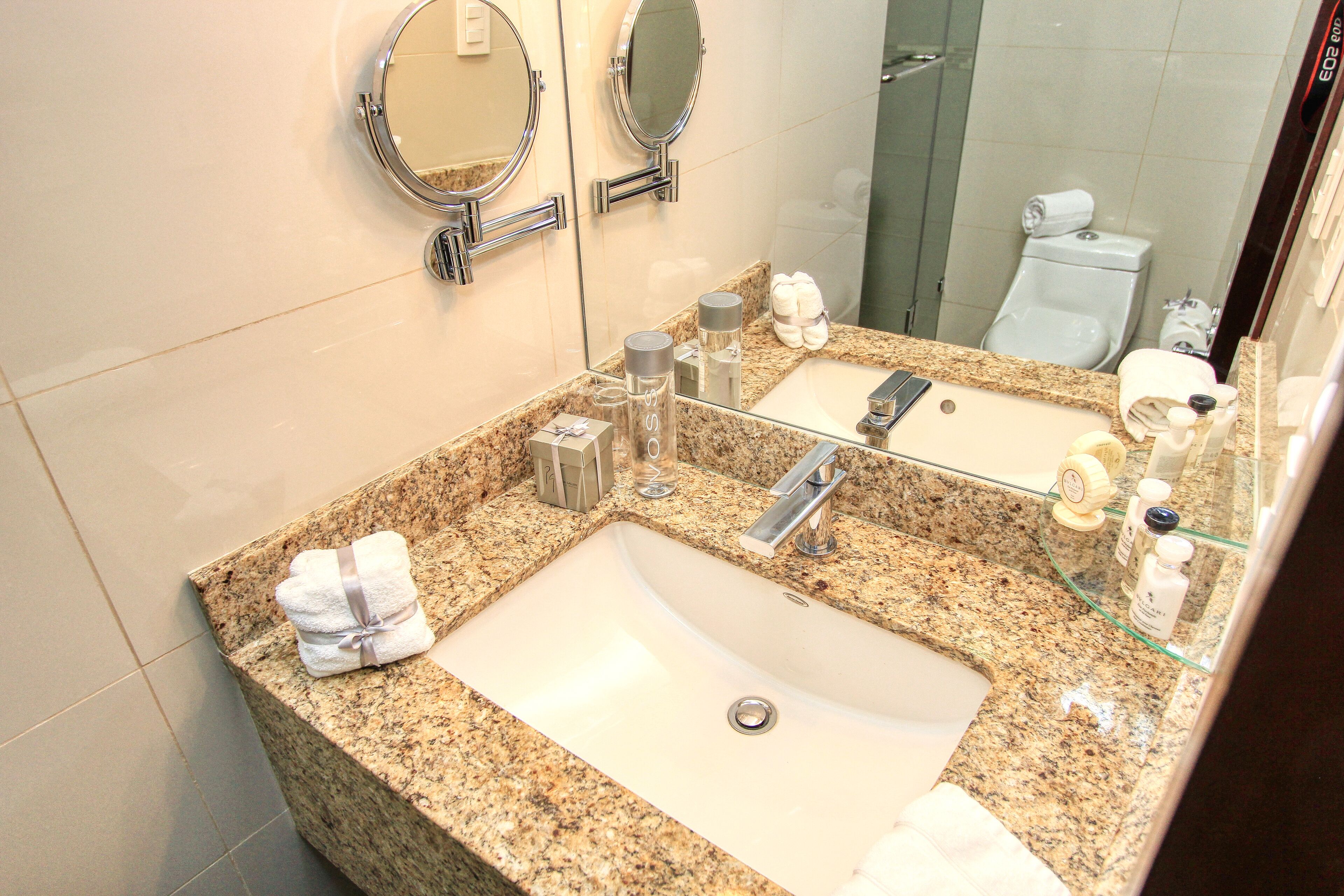 deluxe room, 2 double beds, garden view | bathroom | shower, rainfall showerhead, free toiletries, hair dryer