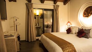 Premium bedding, down duvets, pillow-top beds, in-room safe