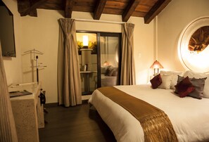 Premium bedding, down comforters, pillowtop beds, in-room safe