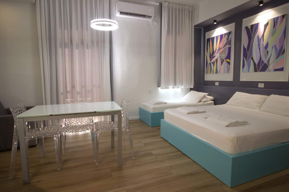 Familie studio suite | 1 slaapkamer, een kluis op de kamer, een bureau, een laptopwerkplek