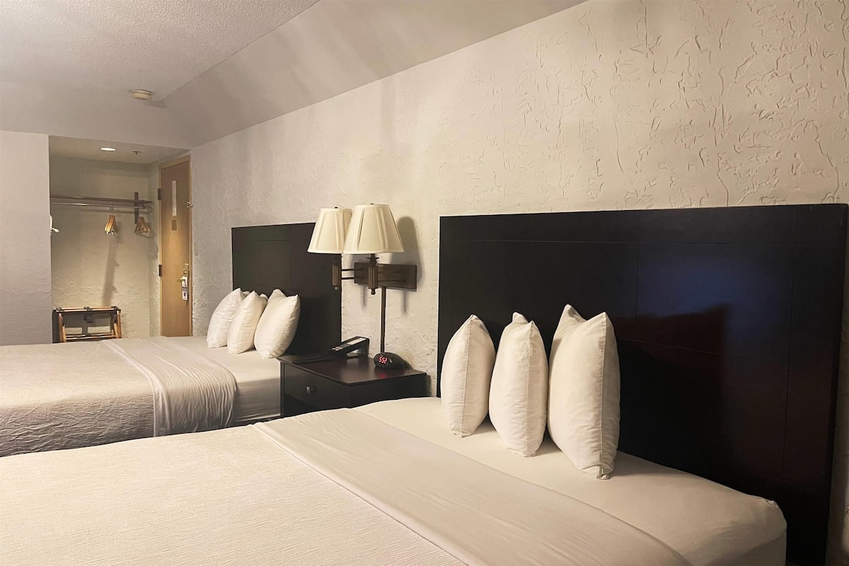 Deluxe Room, 2 Queen Beds, Non Smoking | 1 bedroom, laptop workspace, blackout drapes, iron/ironing board