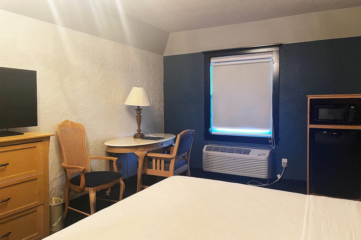 1 bedroom, laptop workspace, blackout drapes, iron/ironing board