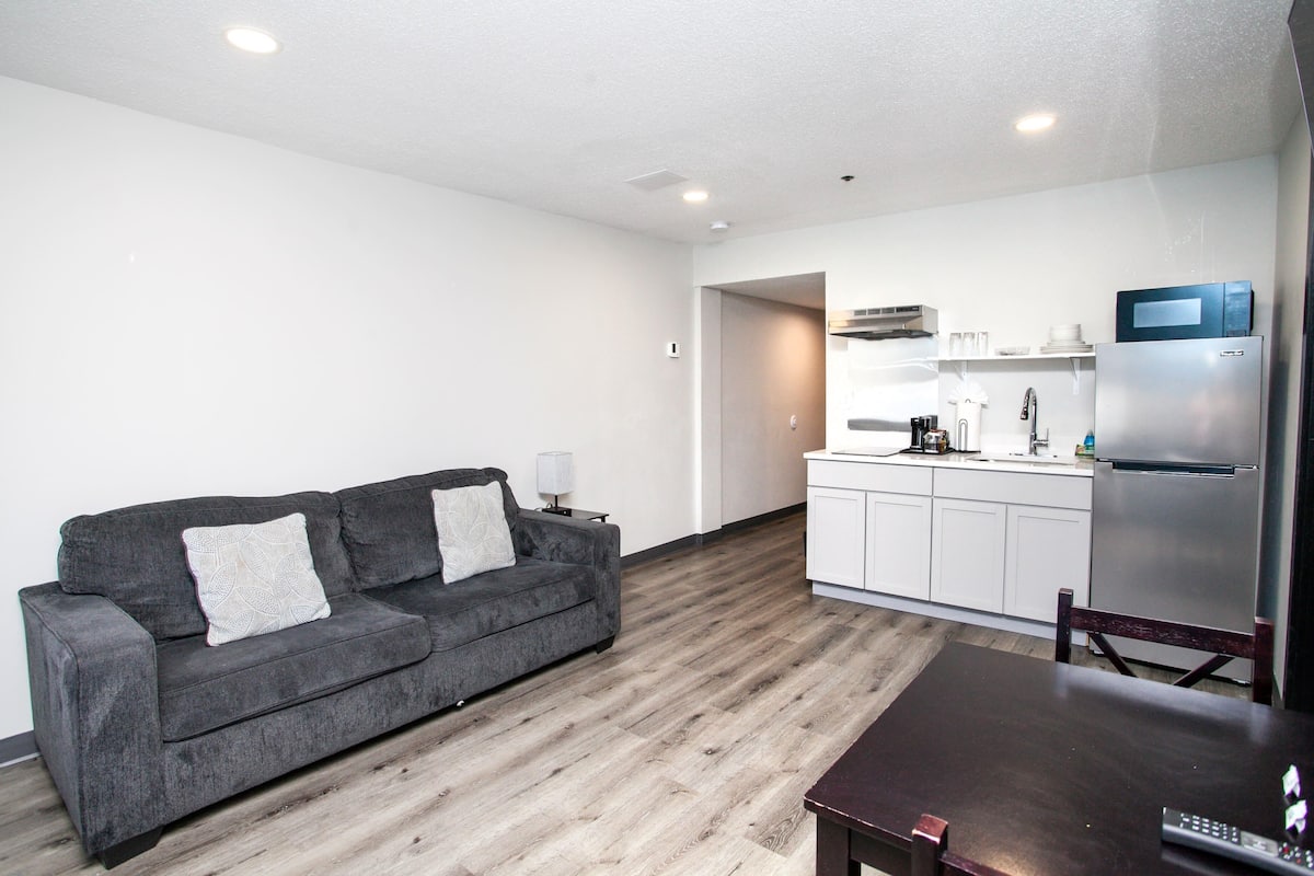 Suite, 1 Bedroom, Non Smoking | Laptop workspace, blackout curtains, iron/ironing board, free WiFi