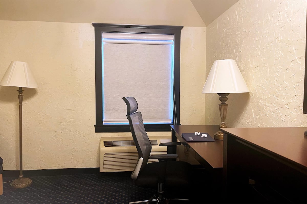 1 bedroom, laptop workspace, blackout drapes, iron/ironing board