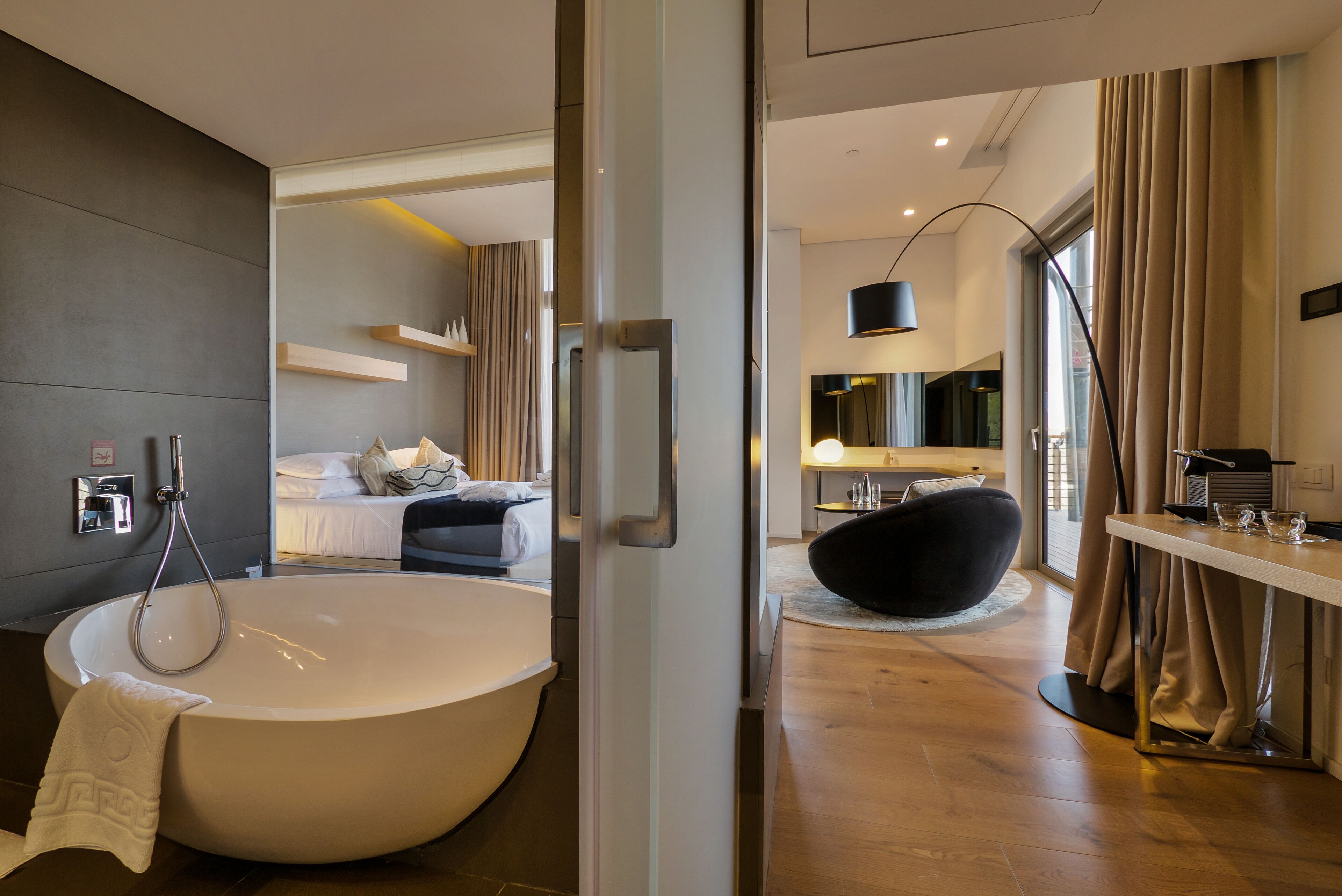 Designer toiletries, hair dryer, bathrobes, slippers