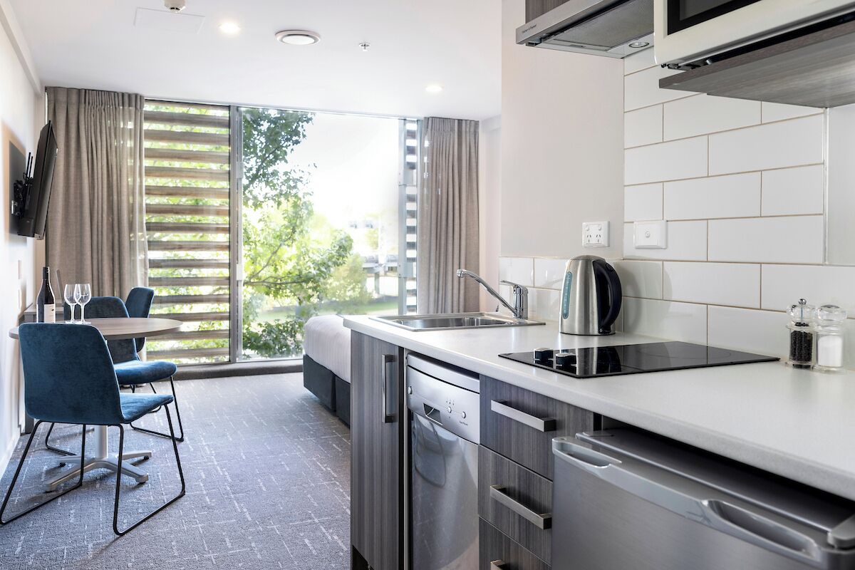 Studio | Private kitchenette | Microwave, stovetop, dishwasher, coffee/tea maker