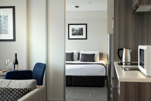 One Bedroom Apartment | Living area | Flat-screen TV, iPod dock