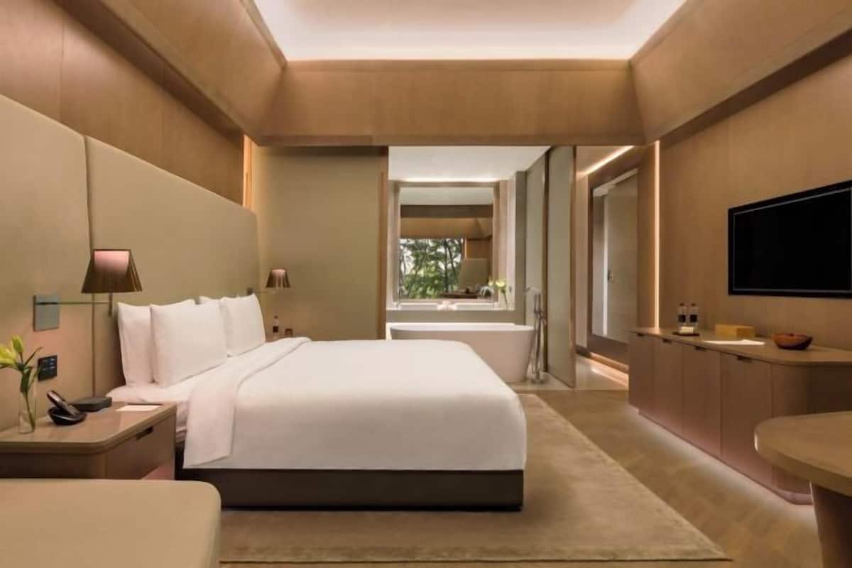 Ropa de cama de alta calidad, cubrecamas y minibar