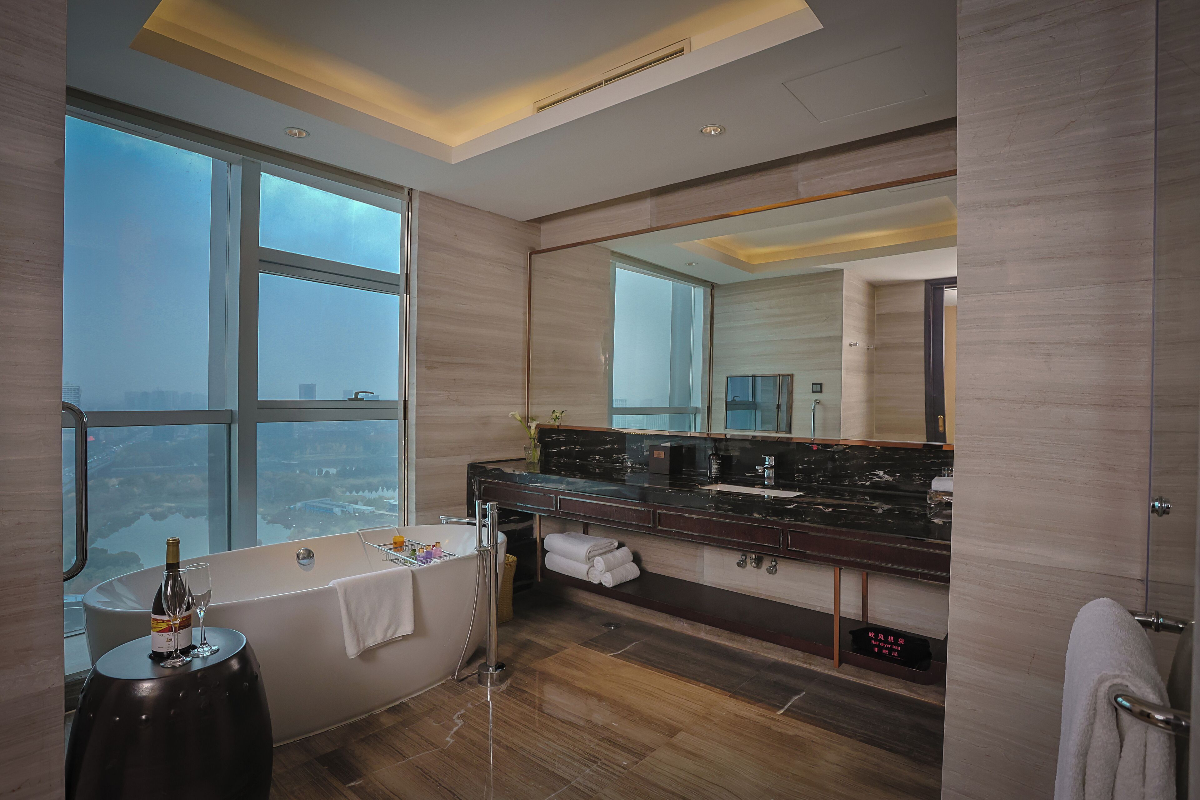 king one bedroom suite lounge access | bathroom | combined shower/bathtub, deep-soaking bathtub, hair dryer, bathrobes
