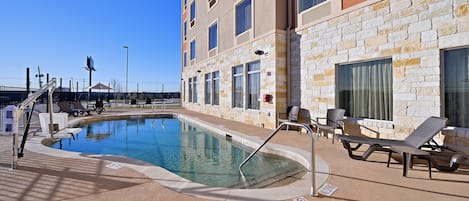 Seasonal outdoor pool, pool loungers