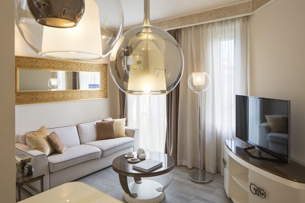 Junior Suite, Kitchenette | Living area | Flat-screen TV, first-run films