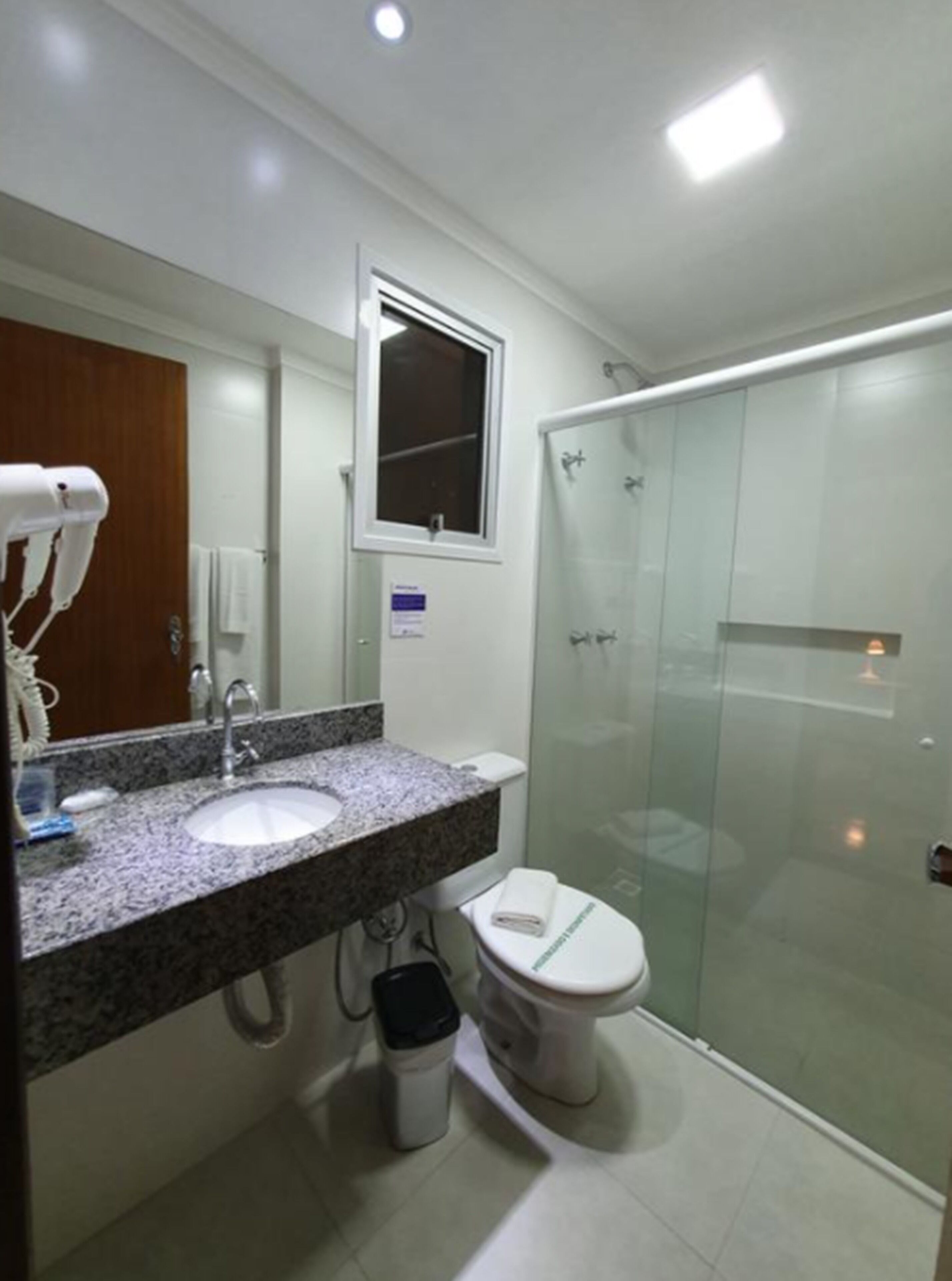 superior triple room | bathroom | shower, rainfall showerhead, free toiletries, hair dryer