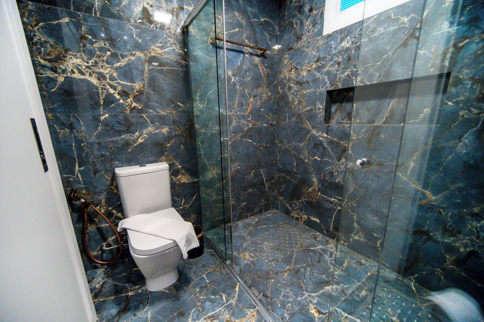 premier suite | bathroom | designer toiletries, hair dryer, towels, soap