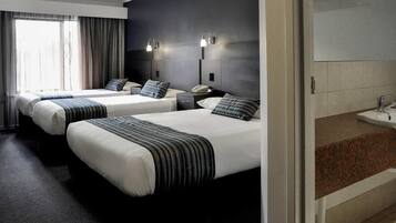 Standard Room, Multiple Beds | Minibar, desk, blackout drapes, iron/ironing board