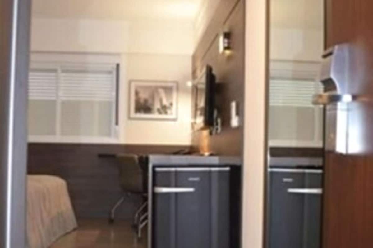 deluxe room | minibar, in-room safe, desk, blackout curtains