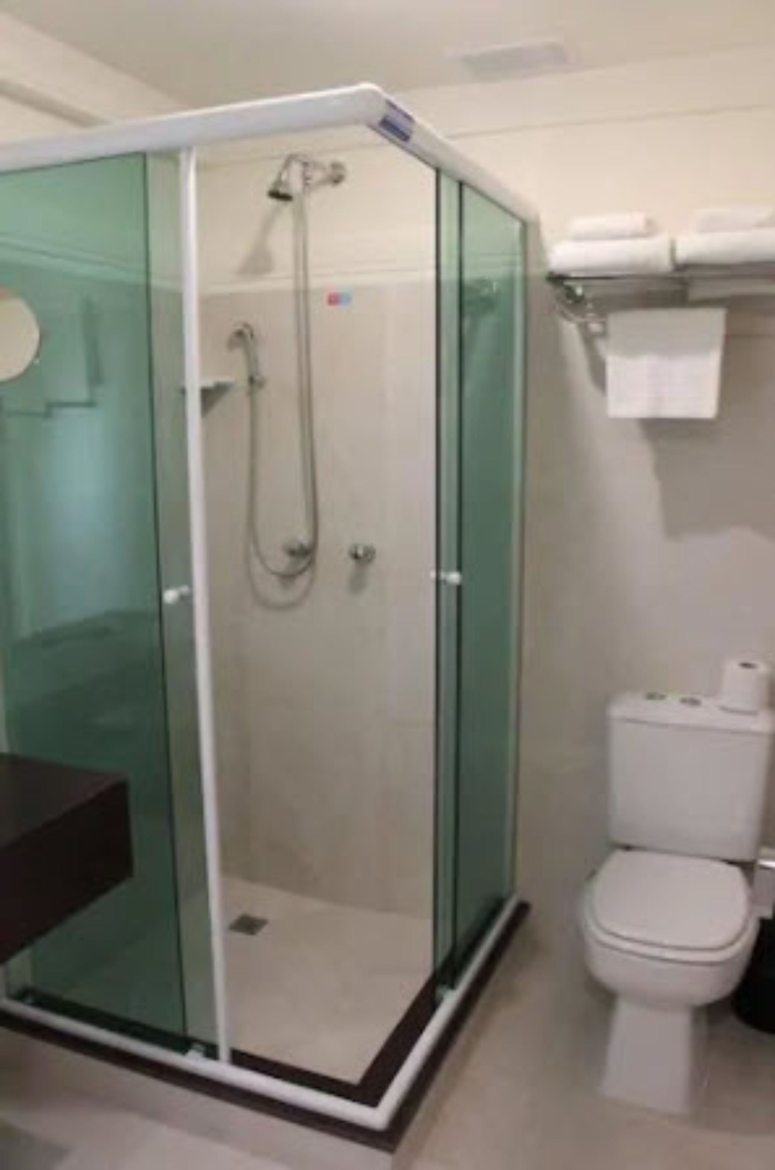 deluxe room | bathroom | shower, free toiletries, hair dryer, bathrobes