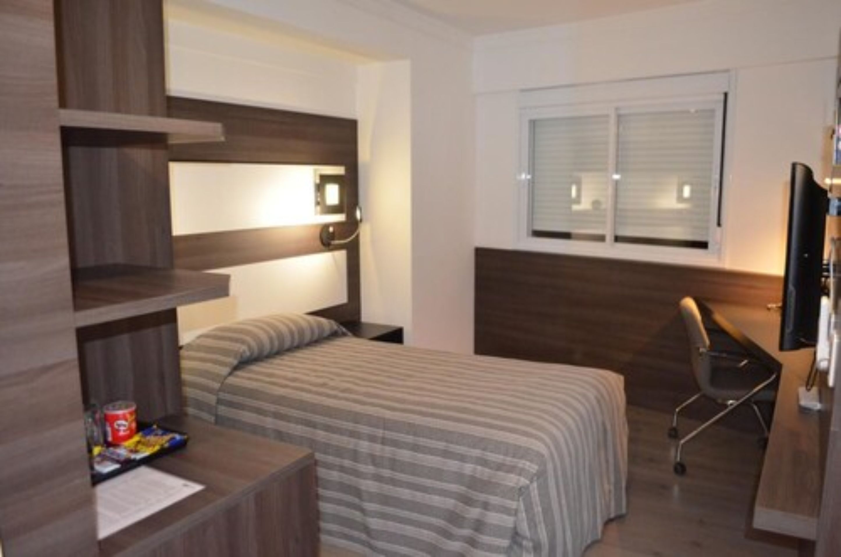 deluxe room | minibar, in-room safe, desk, blackout curtains