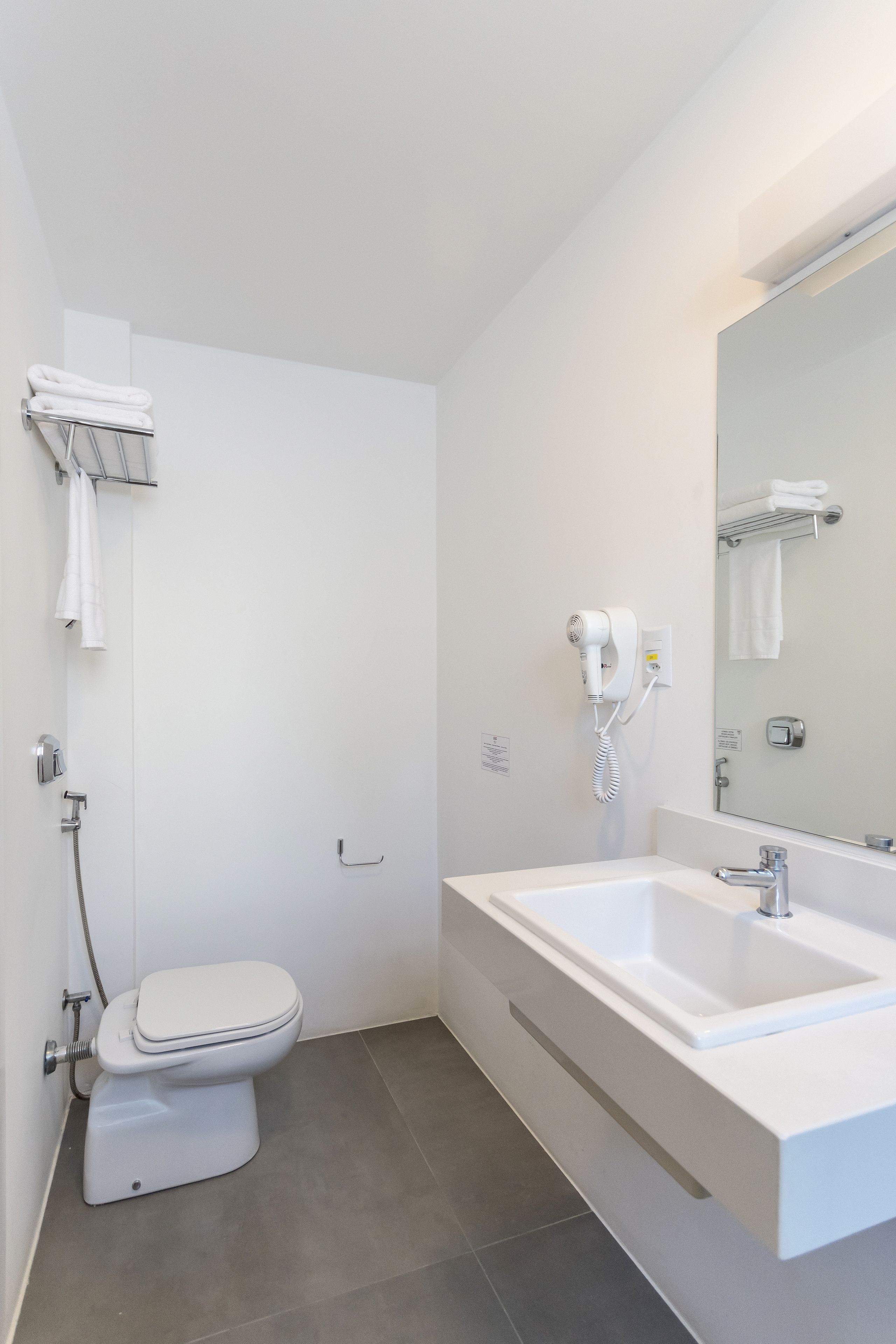 shower, rainfall showerhead, hair dryer, towels