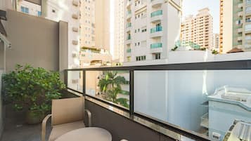 Suite with Balcony | Minibar, in-room safe, blackout drapes, free WiFi