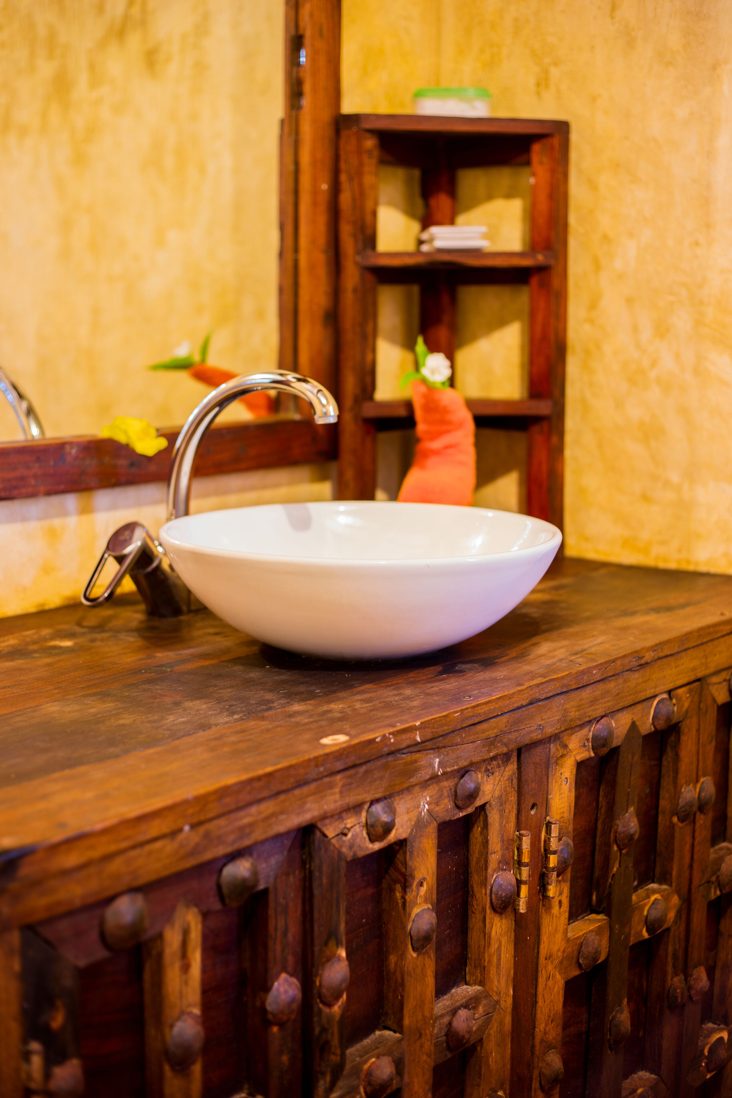 deep-soaking bathtub, rainfall showerhead, towels