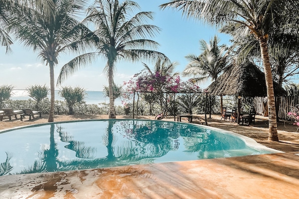 2 outdoor pools, sun loungers