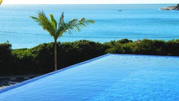 2 outdoor pools, pool umbrellas, sun loungers