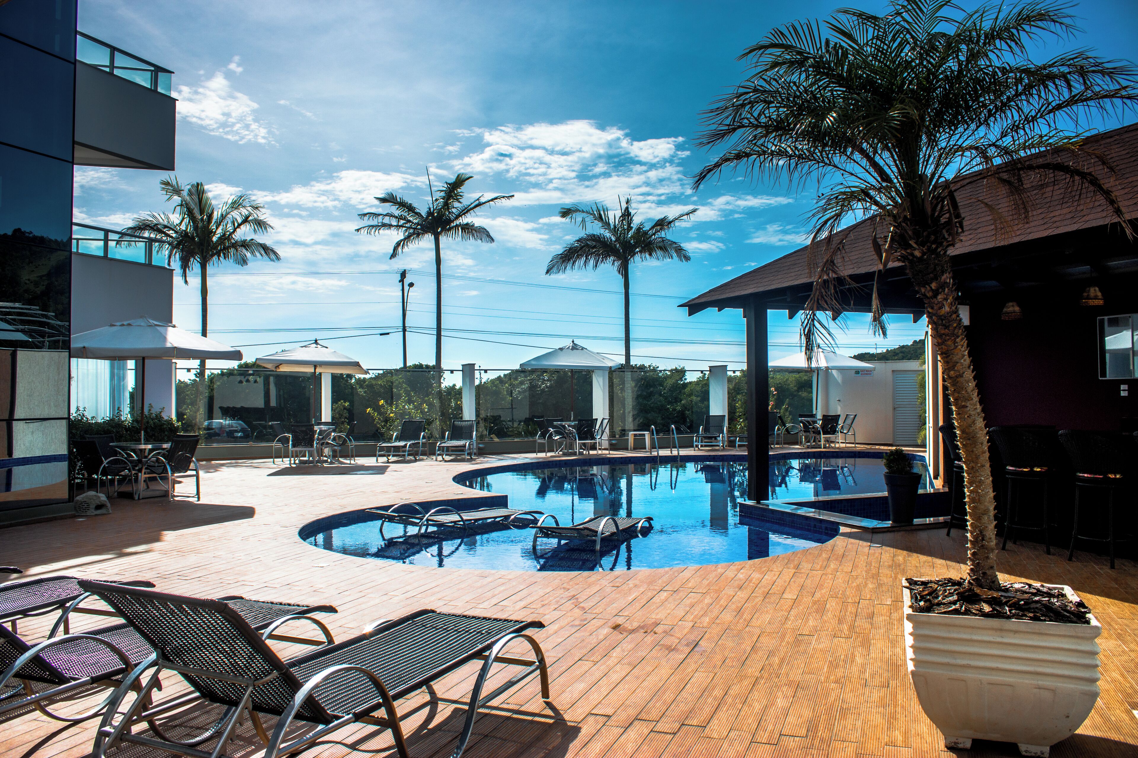 2 outdoor pools, pool umbrellas, pool loungers